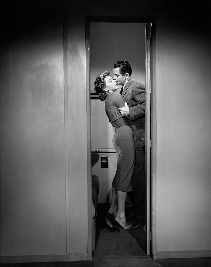 GLENN FORD and GLORIA GRAHAME in HUMAN DESIRE -1954-. Photograph by Album