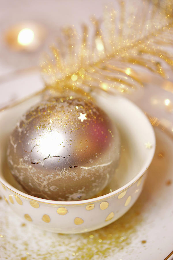 Glittering Christmas Bauble Photograph by Angelica Linnhoff