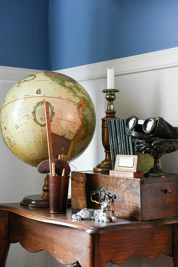 Globe, Wooden Box And Vintage Flea-market Finds On Small, Old Wooden Table Photograph by Loving Brocante