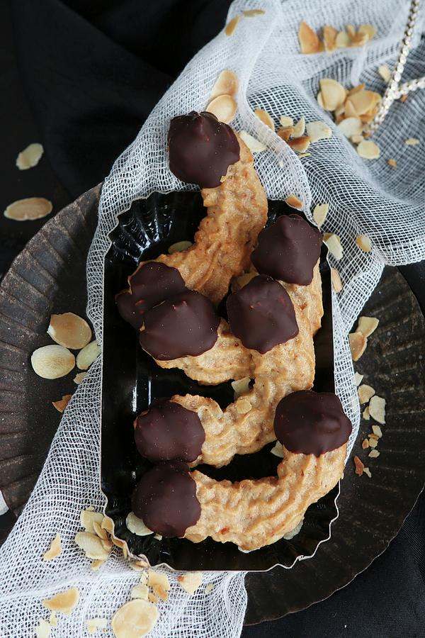 Gluten-free Almond Horns With Dark Chocolate In A Tray Photograph by Regina Hippel