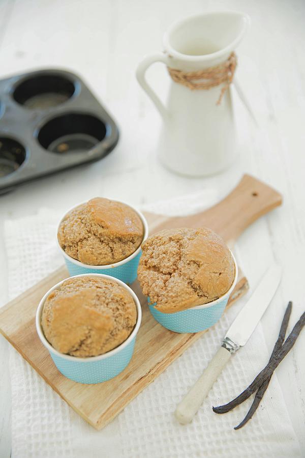 Gluten-free Banana Muffins And Two Vanilla Pods Photograph by Elle Brooks