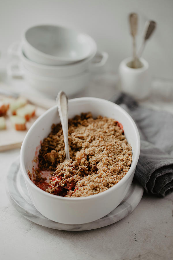 Gluten-free Crumble With Strawberries, Rhubarb, Oats, Walnuts, Cinnamon And Coconut Oil Photograph by Valeria Aksakova