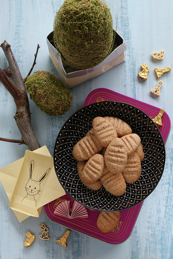 Gluten-free Egg-shaped Biscuits And Easter Decorations Photograph by Regina Hippel