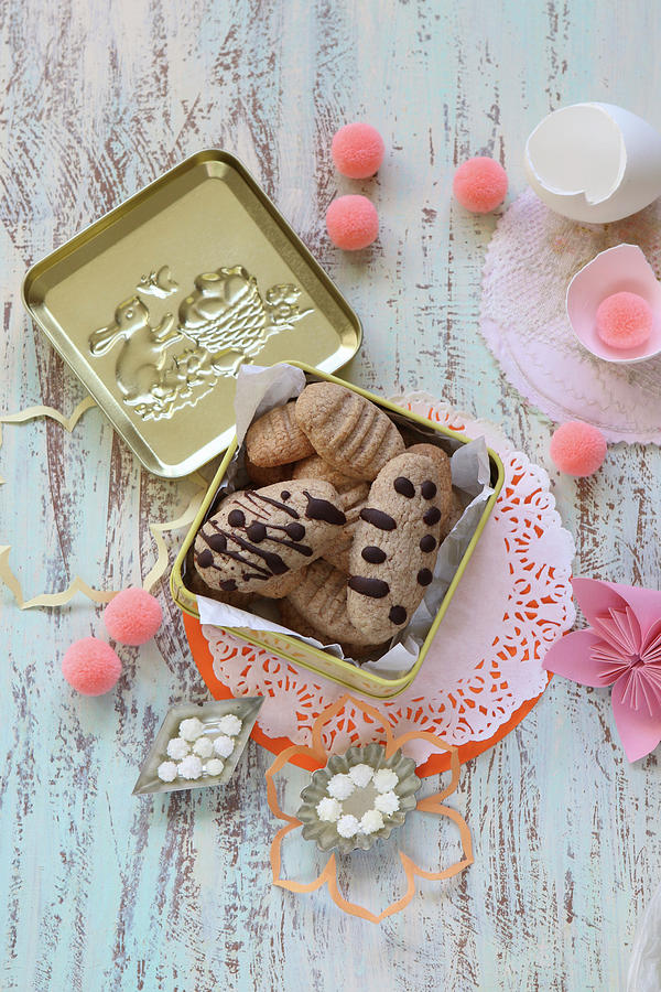 Gluten-free Egg-shaped Biscuits Decorated With Chocolate Photograph by Regina Hippel