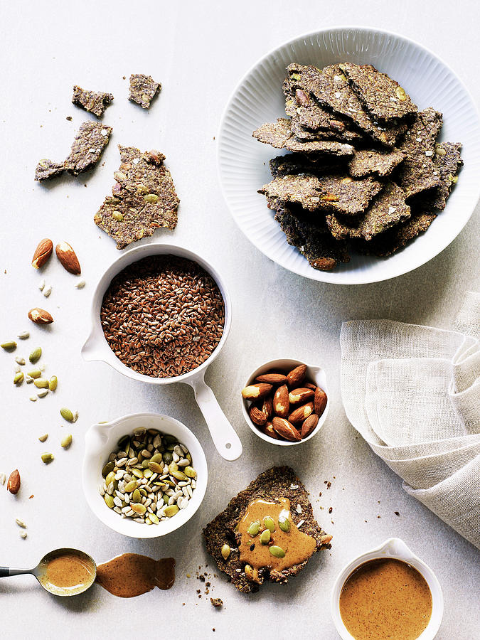 Gluten Free Flax Seed Cracker With Almond Butter, Nuts And Seeds Photograph by Valerie Janssen