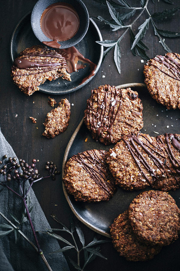Gluten-free Millet Biscuits With Chocolate Coating And Sea Salt Photograph by Claudia Gdke