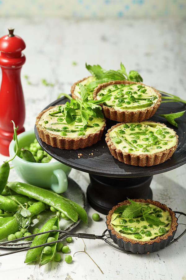 Gluten-free Pea Tartlets With Fresh Goats Cheese Photograph by Ulrike Stockfood Studios / Holsten