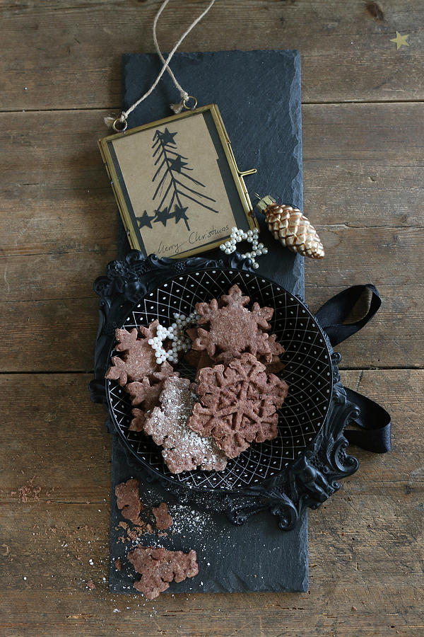 Gluten-free Snowflake Biscuits With Cocoa And Icing Sugar For Christmas Photograph by Regina Hippel