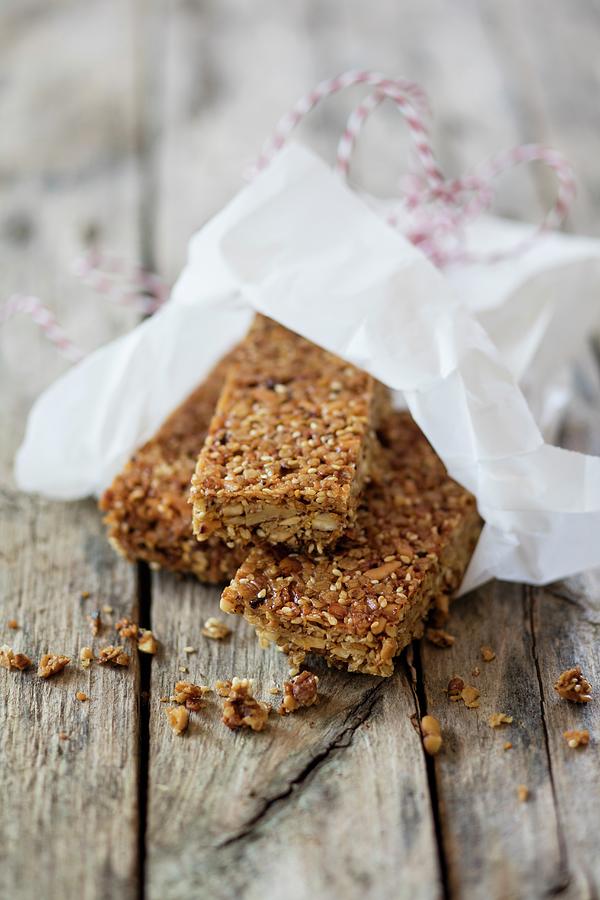Gluten-free Vegan Muesli Bars With Nuts And Lupine Flakes Photograph by Jan Wischnewski