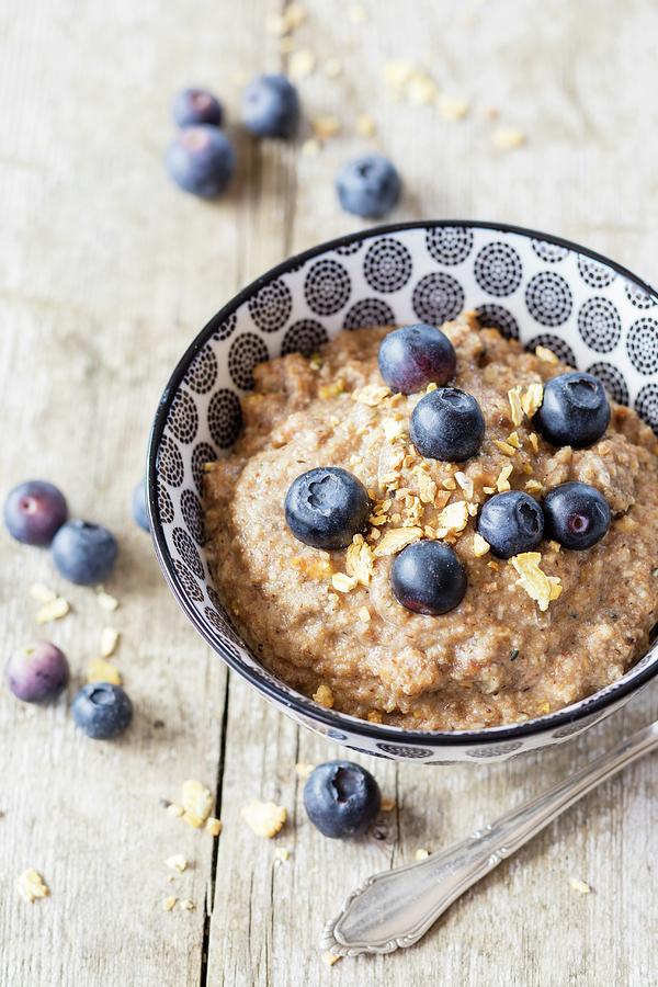 Gluten-free Vegan Tigernut Porridge With Hemp Seeds, Teff Flakes And Berries Photograph by Jan Wischnewski