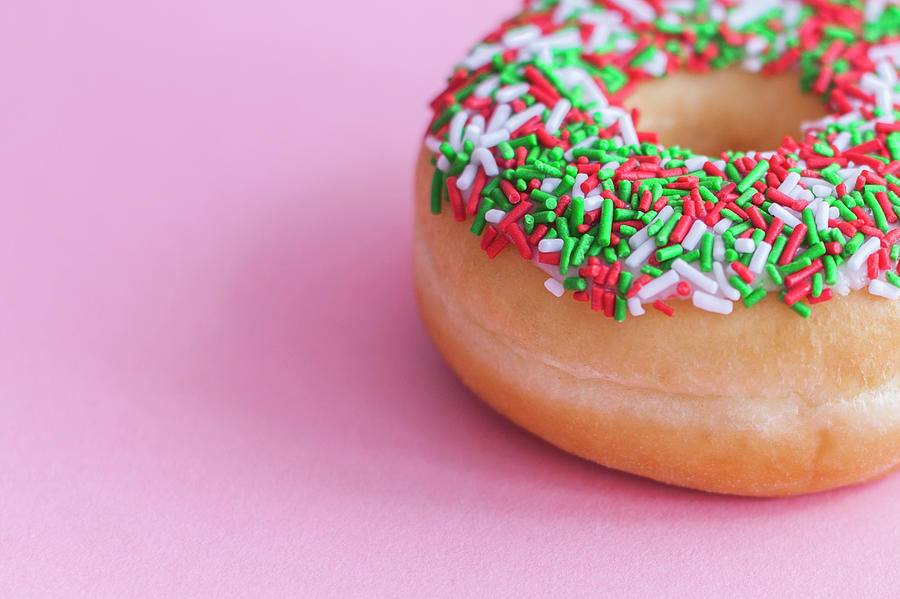 Glzed Donut With Sprinkles On A Pink Photograph by Steven Errico