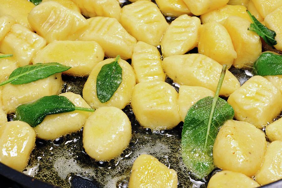 Gnocchi With Butter And Sage In A Pan close-up Photograph by Ina Peters