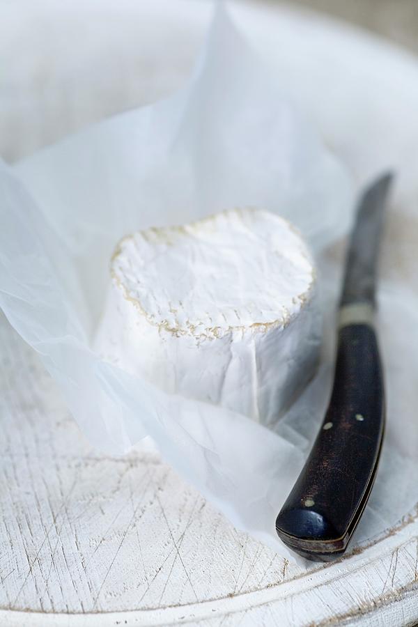 Cheese Photograph - Goats Cheese And A Rustic Knife by Victoria Firmston