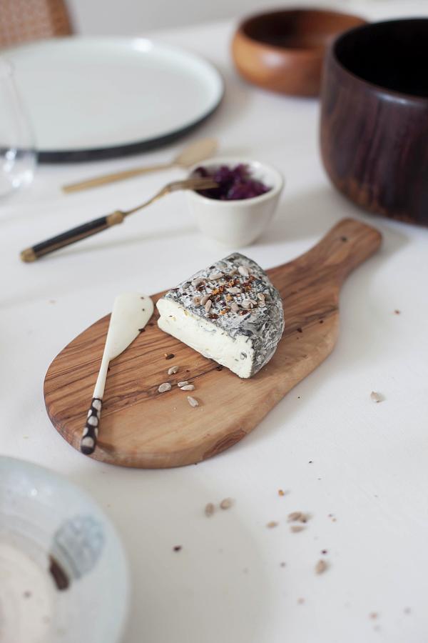 Goats Cheese And Cheese Knife On Wooden Board Photograph by Holly Marder