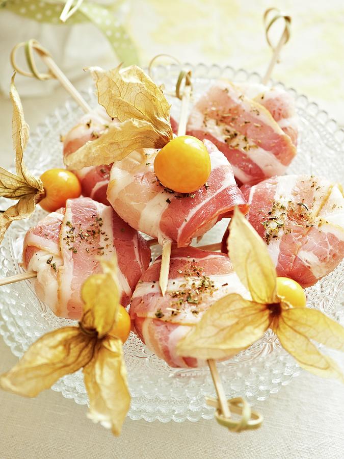 Cheese Photograph - Goats Cheese In Bacon With Physalis For An Easter Brunch by Hannah Kompanik