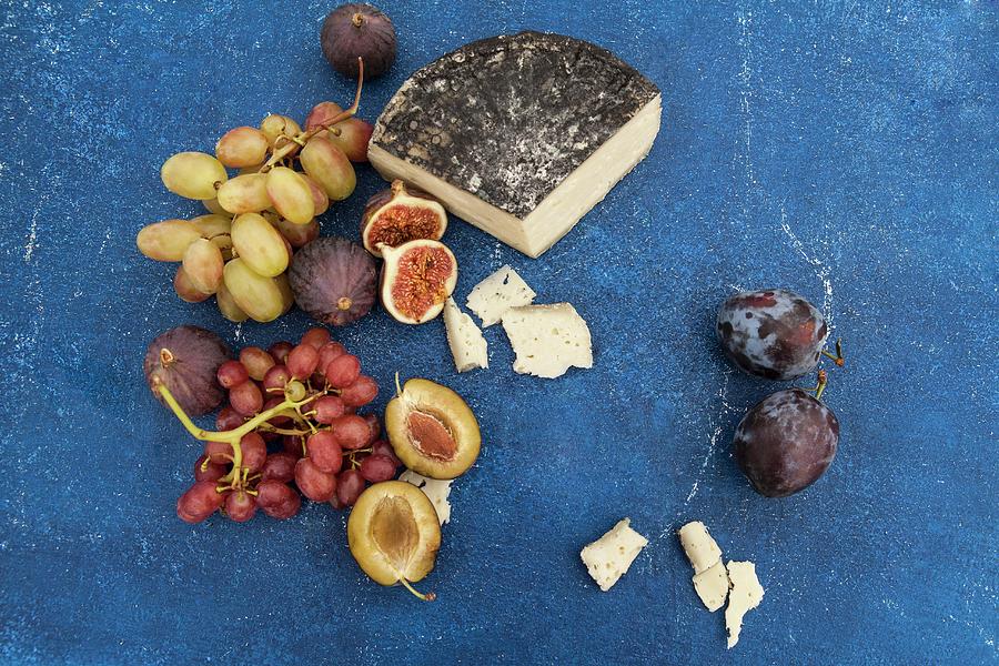 Goats Cheese In Cinders With Plums, Grapes And Figs Photograph by Nika Moskalenko