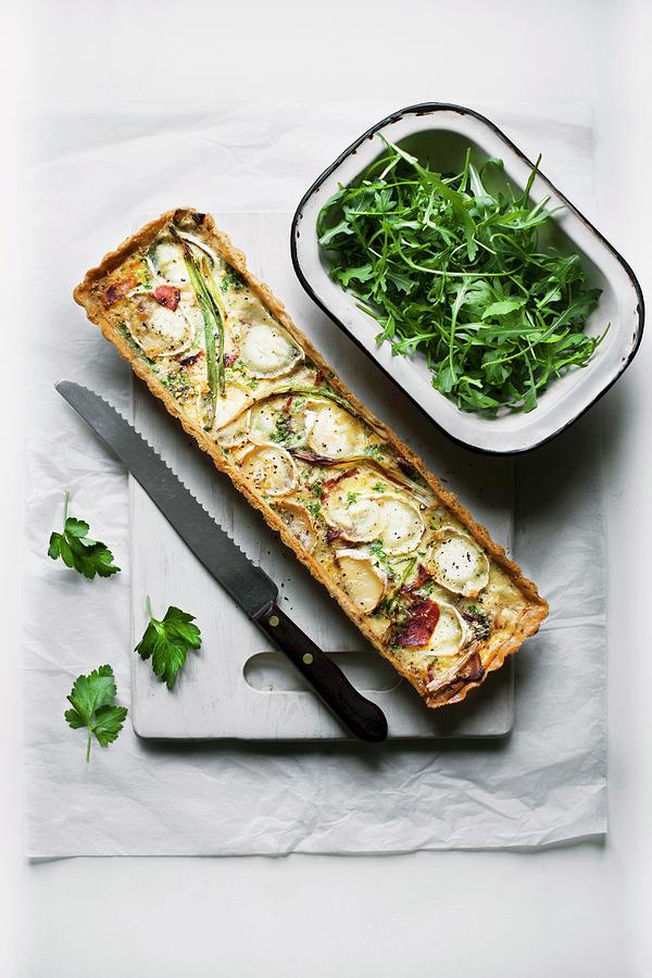 Goats Cheese Tart With Rocket And Parsley Photograph by Magdalena Hendey