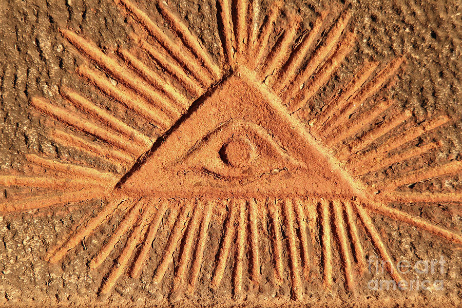 Gods eye - old relief Photograph by Michal Boubin