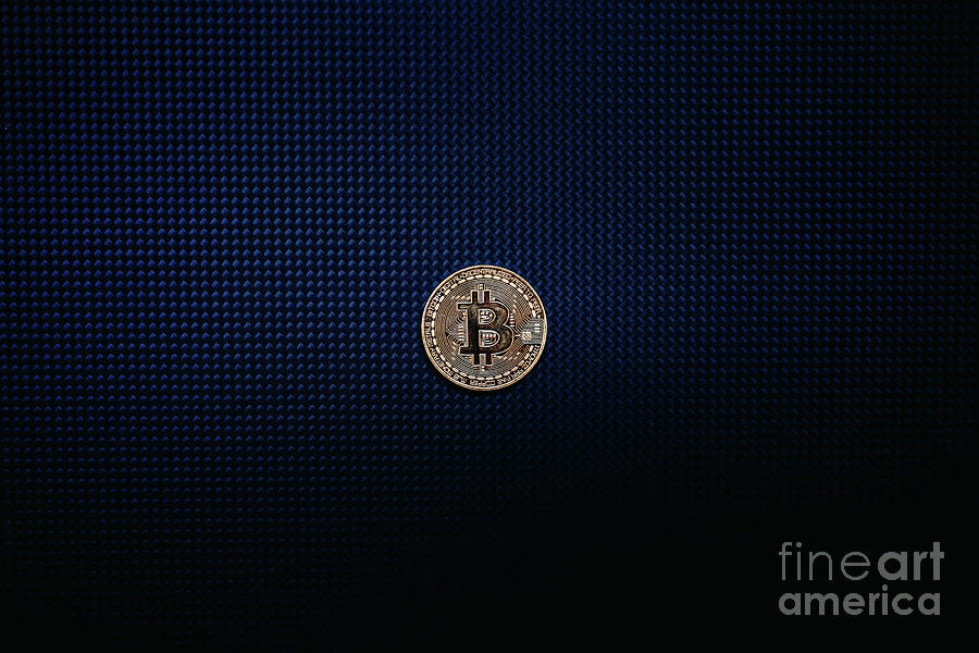 Golden bitcoin coin isolated on blue dark background Photograph by Joaquin Corbalan