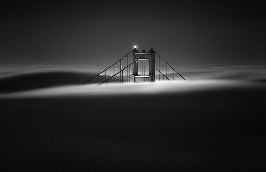 Golden Gate Bridge In Low Fog Photograph by Aidong Ning