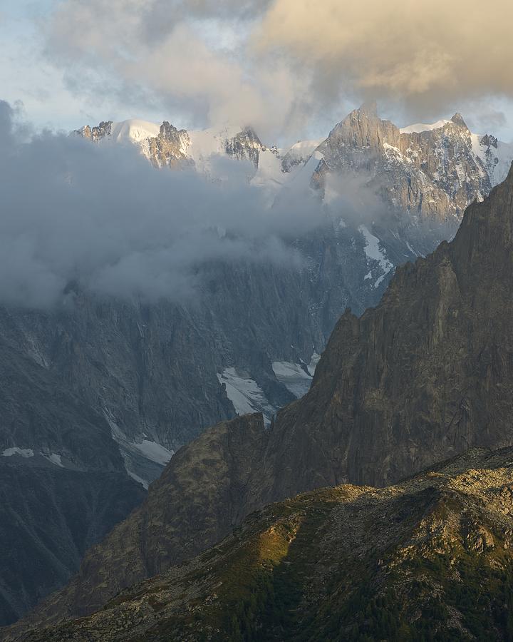 Golden Light catches the peak of Grandes Jorasses Photograph by Stephen Taylor