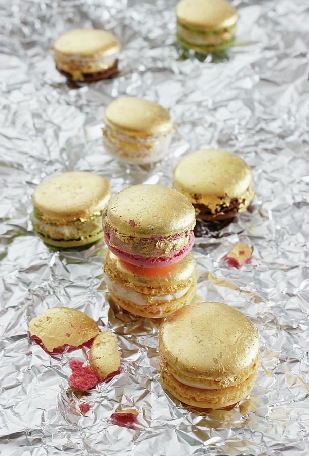 Golden Macaroons On Silver Foil Photograph by Petr Gross