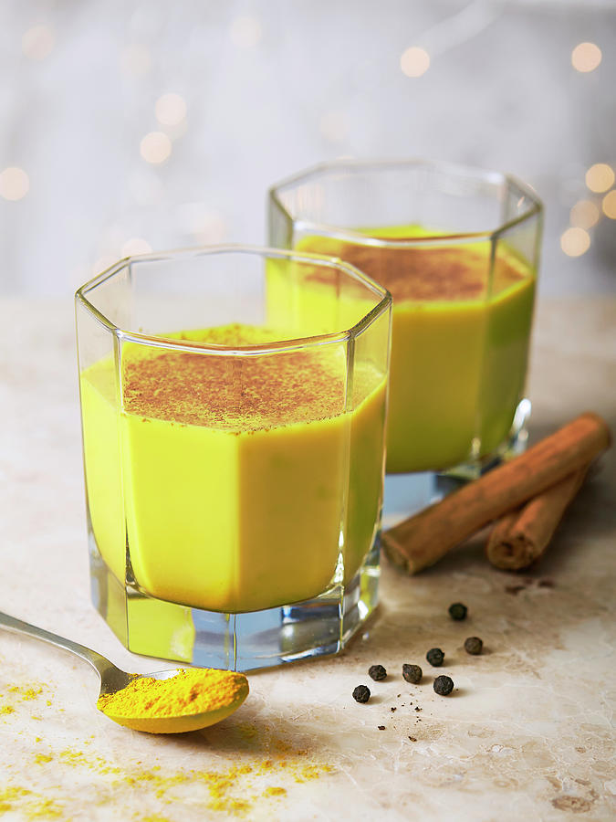 Golden Milk With Tumeric And Cinnamon Photograph by Ali Sid