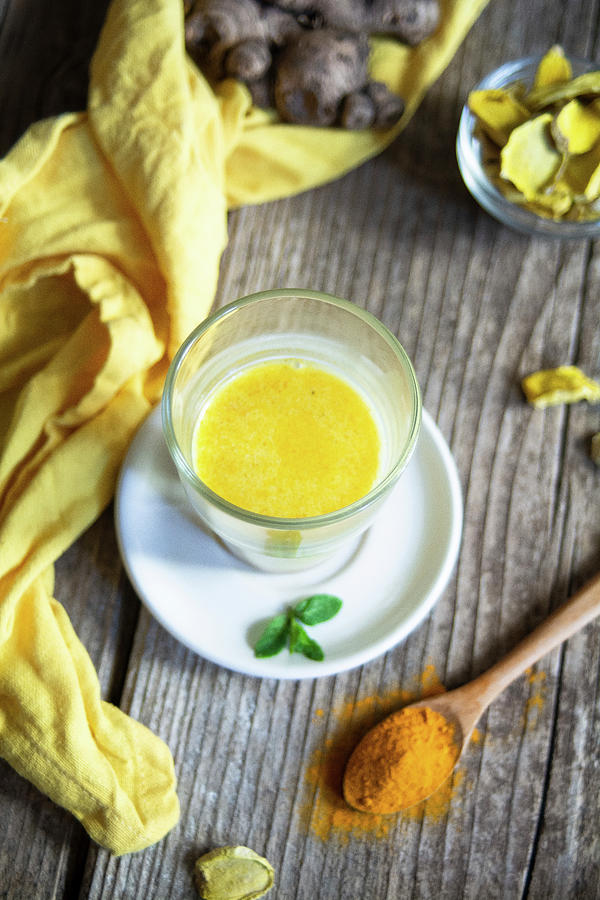 Golden Milk With Turmeric And Mint Photograph by Marya Cerrone