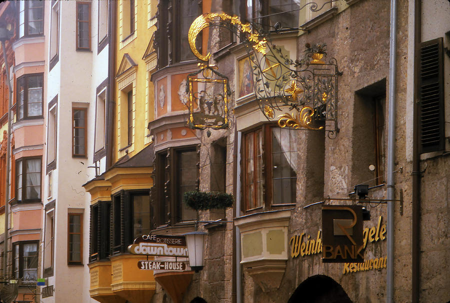 Golden signs on medieval facade, apartment  Photograph by Steve Estvanik