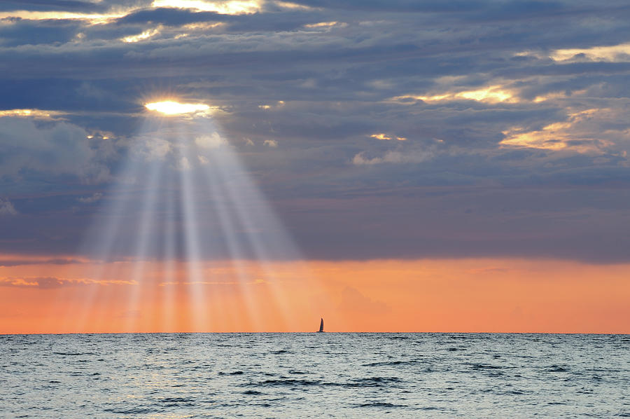 Golden Sunbeam Flowing Over Sailing Photograph by Olaser