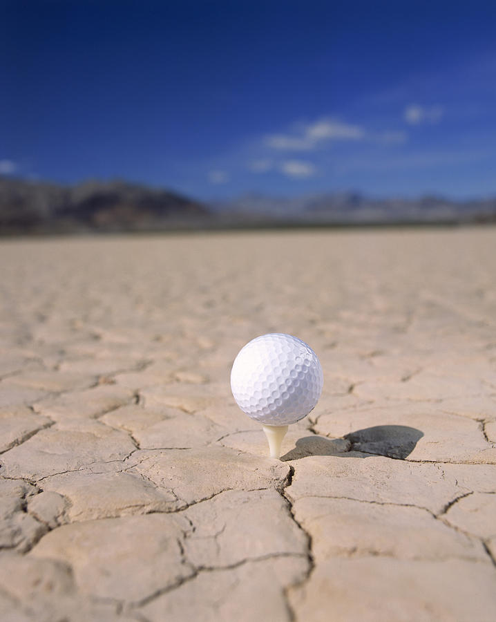 Golf Ball And Tee Photograph by Thomas Winz
