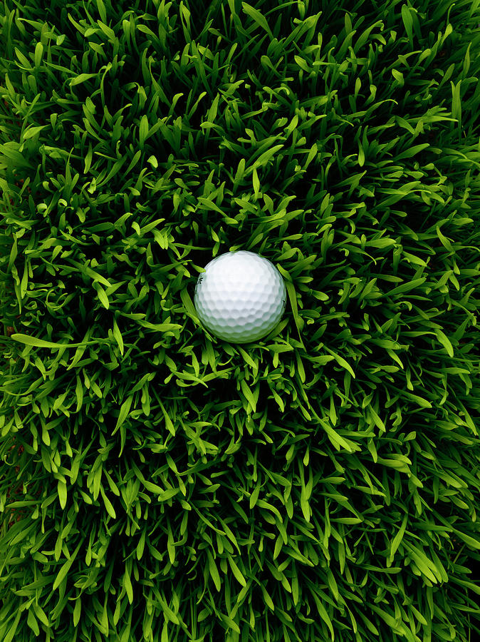 Golf Ball In Grass by Chris Stein