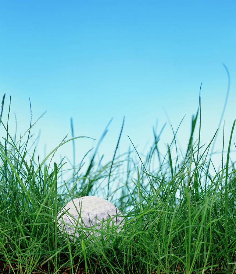 Golf Ball In Long Grass Photograph by Peter Dazeley