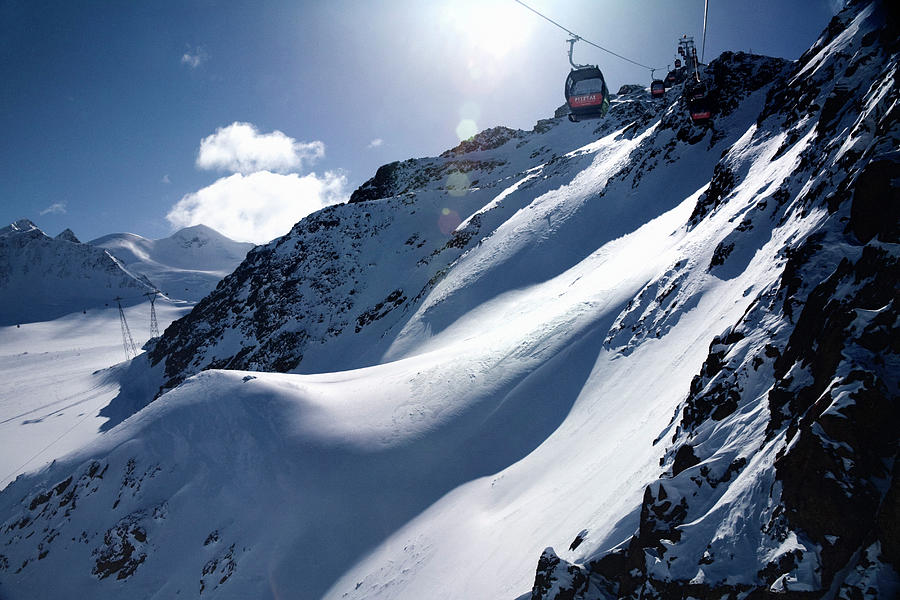 Gondola Over Snow Covered Mountains Digital Art by Sandra Raccanello
