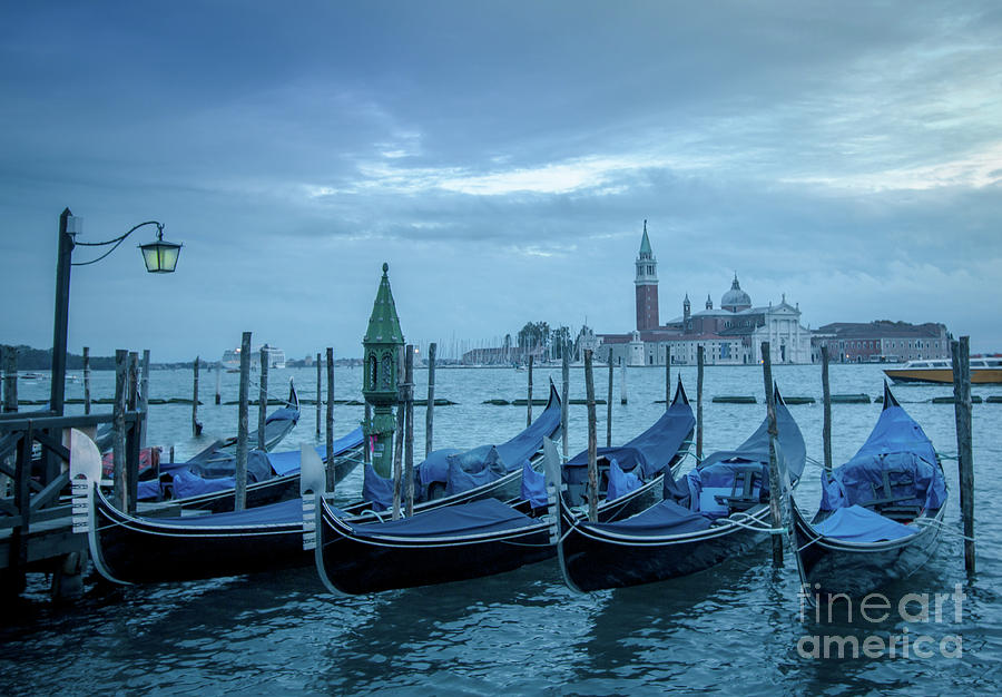 Gondolas in Venice with the church San Giorgo Maggiore in the ba Photograph by Amanda Mohler