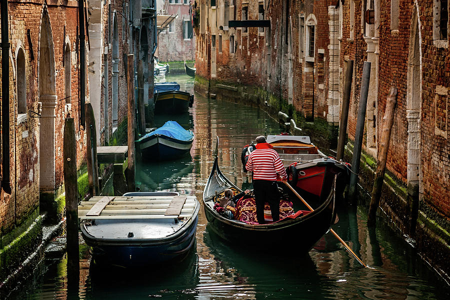 Gondoliere In Venice Photograph by Carlos Malvar