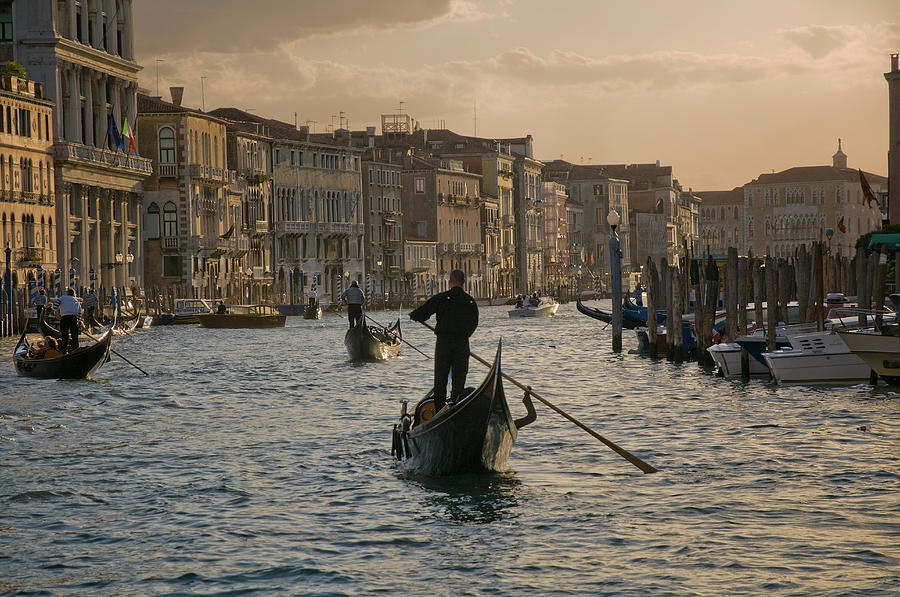 Gondoliers On The Grand Canal, Venice Photograph by Stuart Mccall