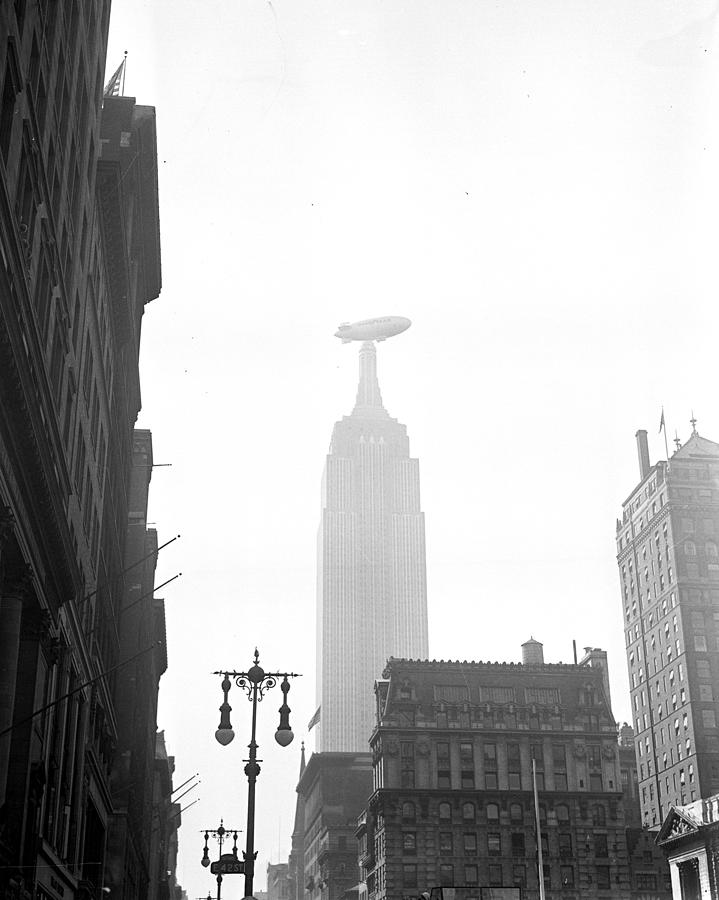 Goodyear Blimp Flies Near The Empire Photograph by New York Daily News Archive