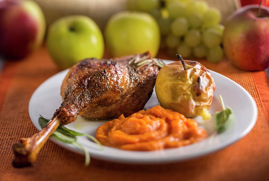 Goose Leg With Pumpkin Puree And A Baked Apple Photograph by Lukasz Zandecki