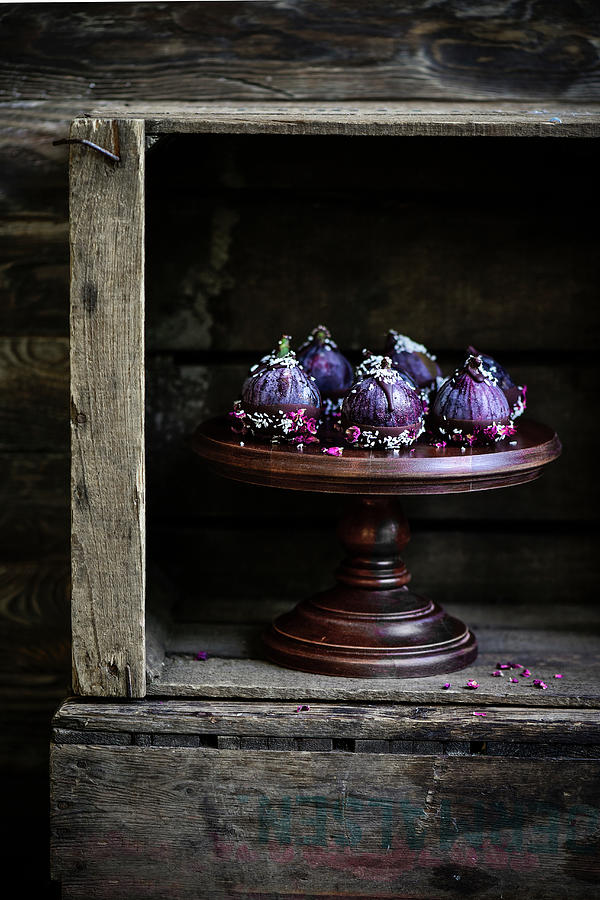 Gorgeous Purple Figs Dipped In Dark Chocolate Sprinkled With Coconut And Rose Petals Photograph by Donna Crous