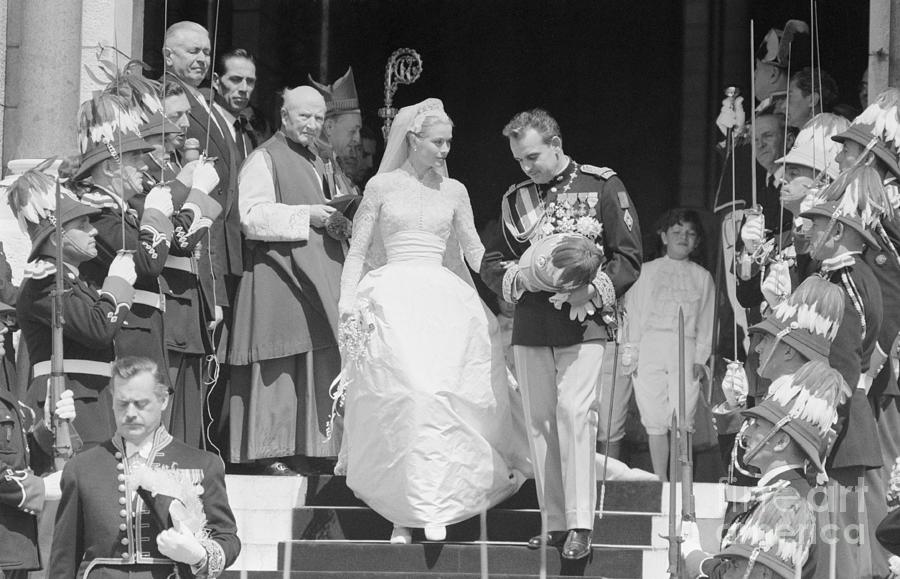 Grace Kelly And Prince Rainier Exiting Photograph by Bettmann