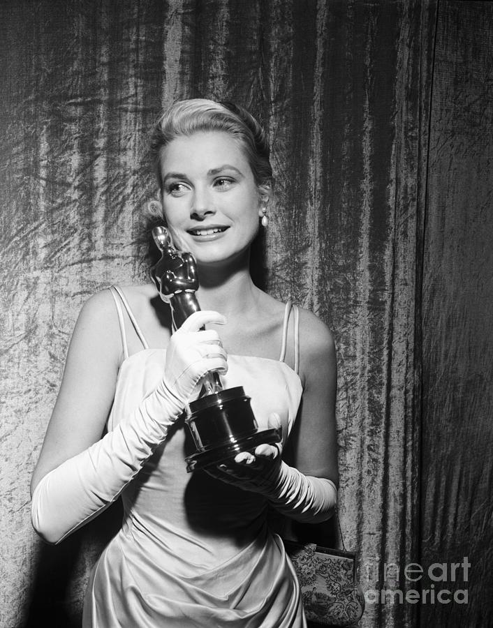 Grace Kelly Holding Her Oscar Photograph by Bettmann