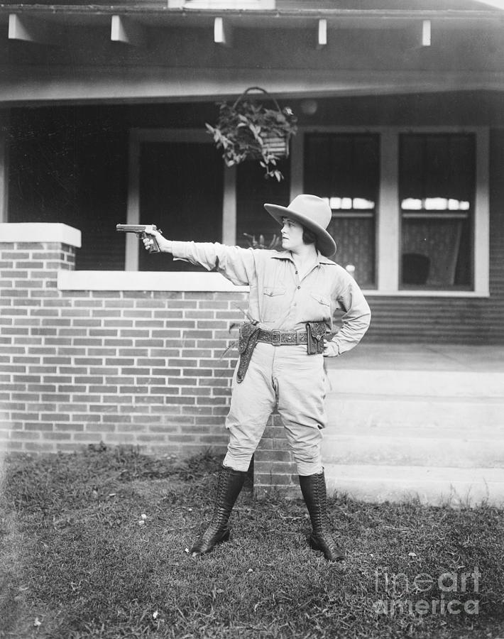 Grace Mcclellan Aiming A Pistol Photograph by Bettmann