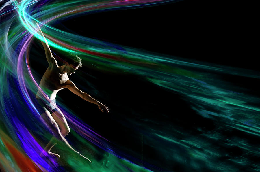 Graceful Dancer In Swirl Of Colored Photograph by John Rensten