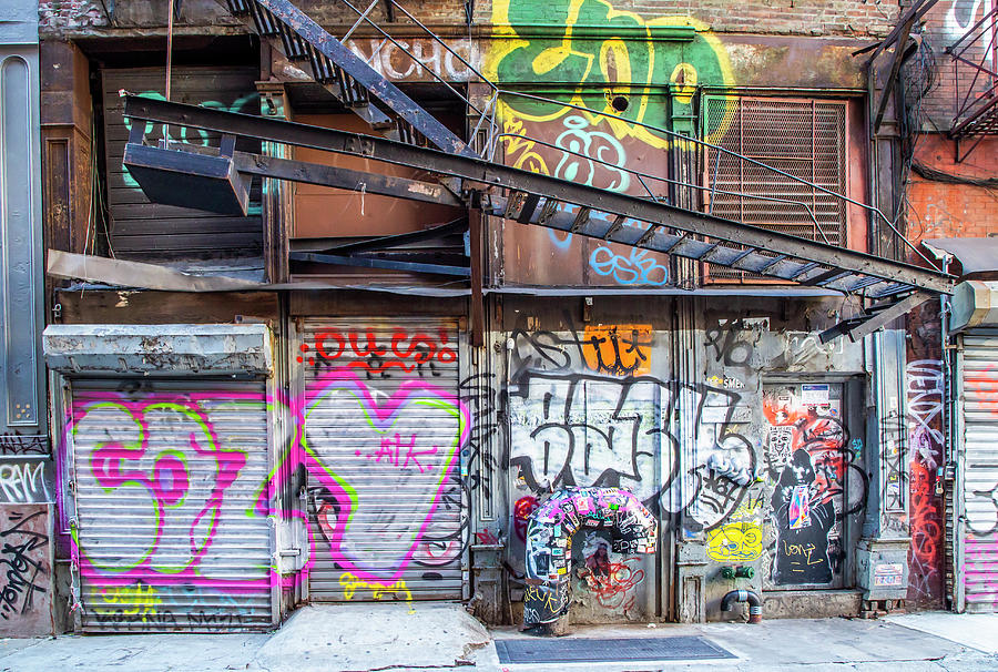 Graffitied Corrugated Doors Photograph by Cate Franklyn