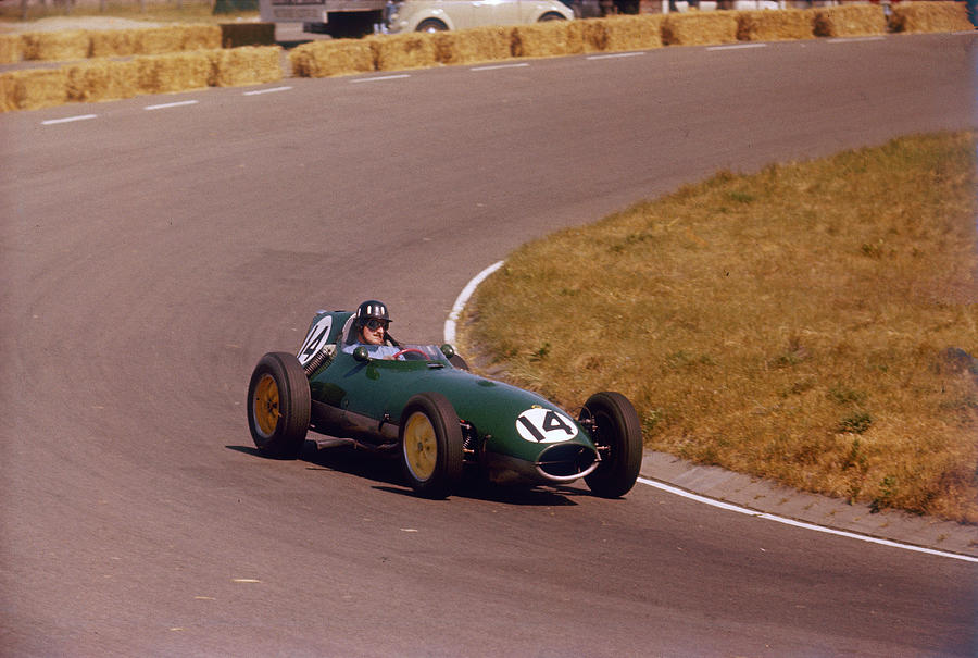 Graham Hill Driving A Lotus Climax 16 Photograph by Heritage Images