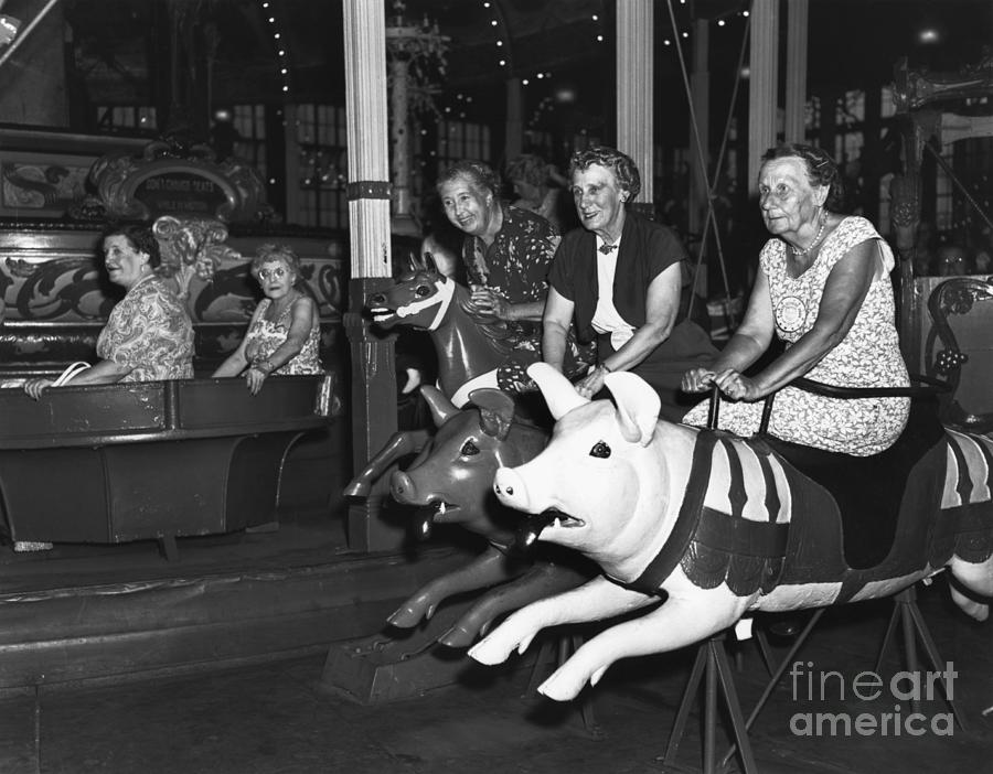 Grandmothers On A Merry-go-round Photograph by Bettmann