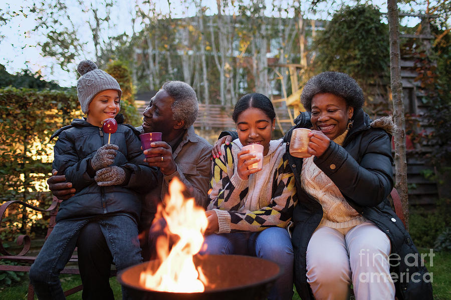 Grandparents And Grandchildren Drinking Hot Cocoa Photograph by Caia ...