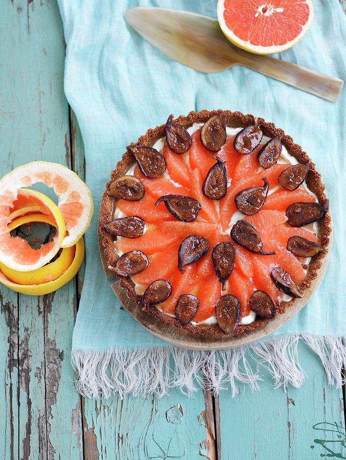 Grapefruit And Fig Tart Seen From Above Photograph by Leigh Beisch