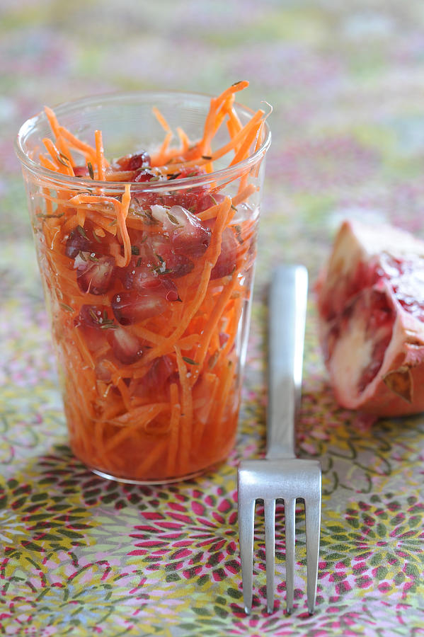 Grated Carrot And Pomegranate Salad With Star Anise Photograph by Schmitt
